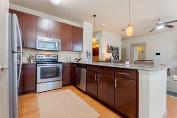 Kitchen with brown cabinets